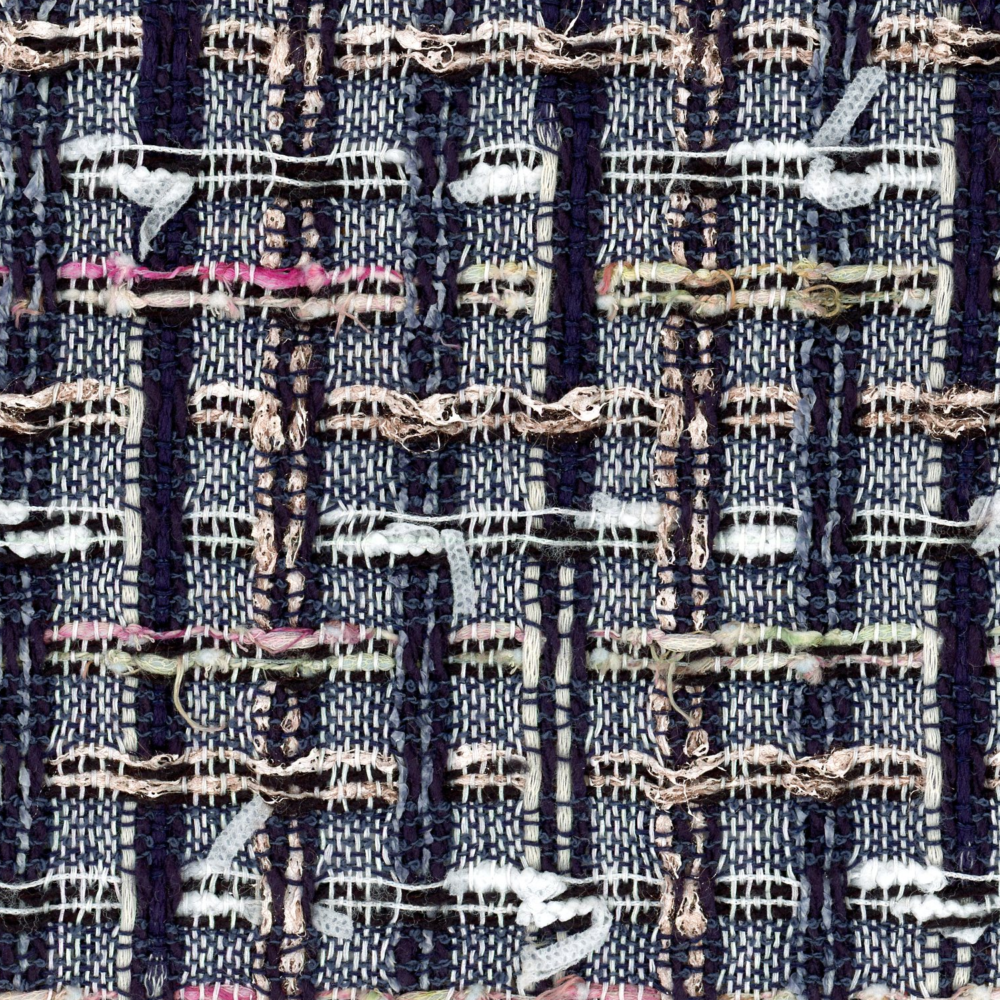 Navy and white tweed with a white tufty yarn yarn in the weft.