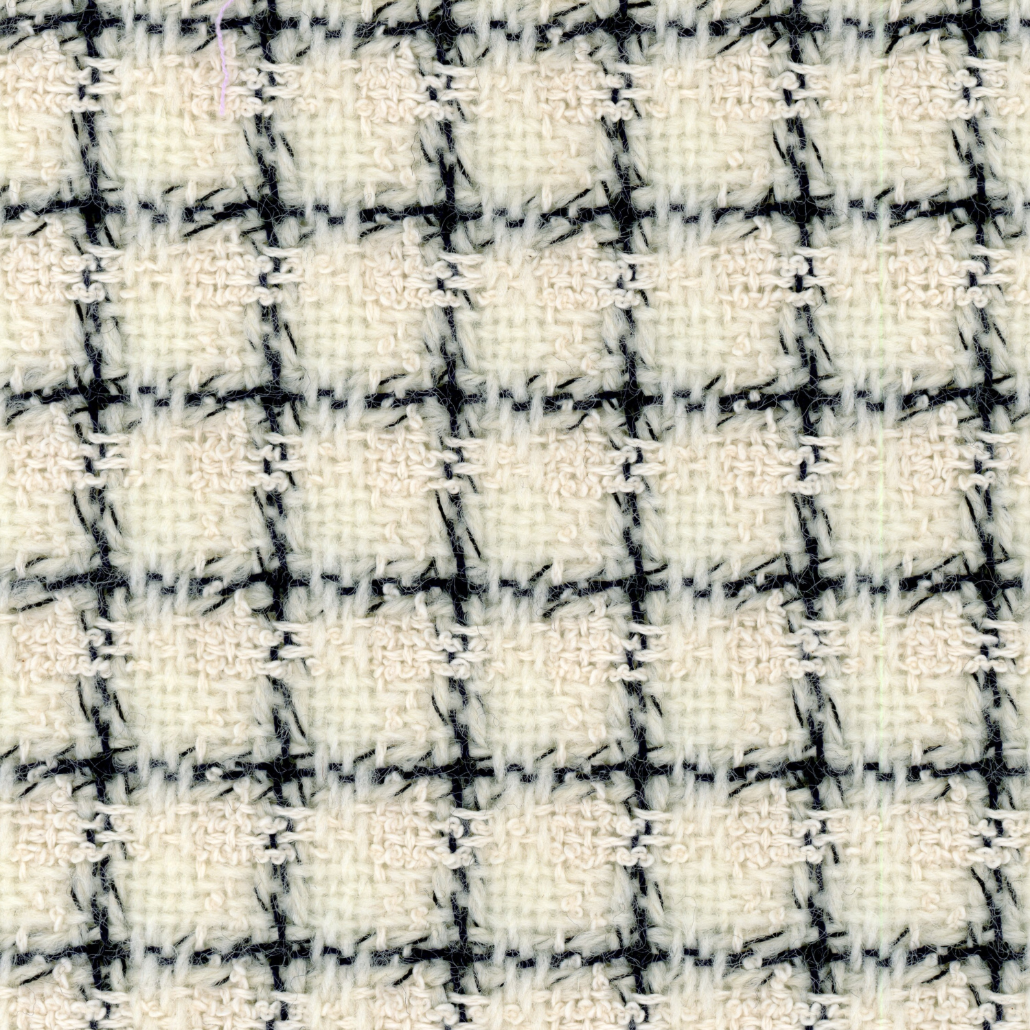 Cream and black boucle check tweed. Equal blend of wool and cotton.