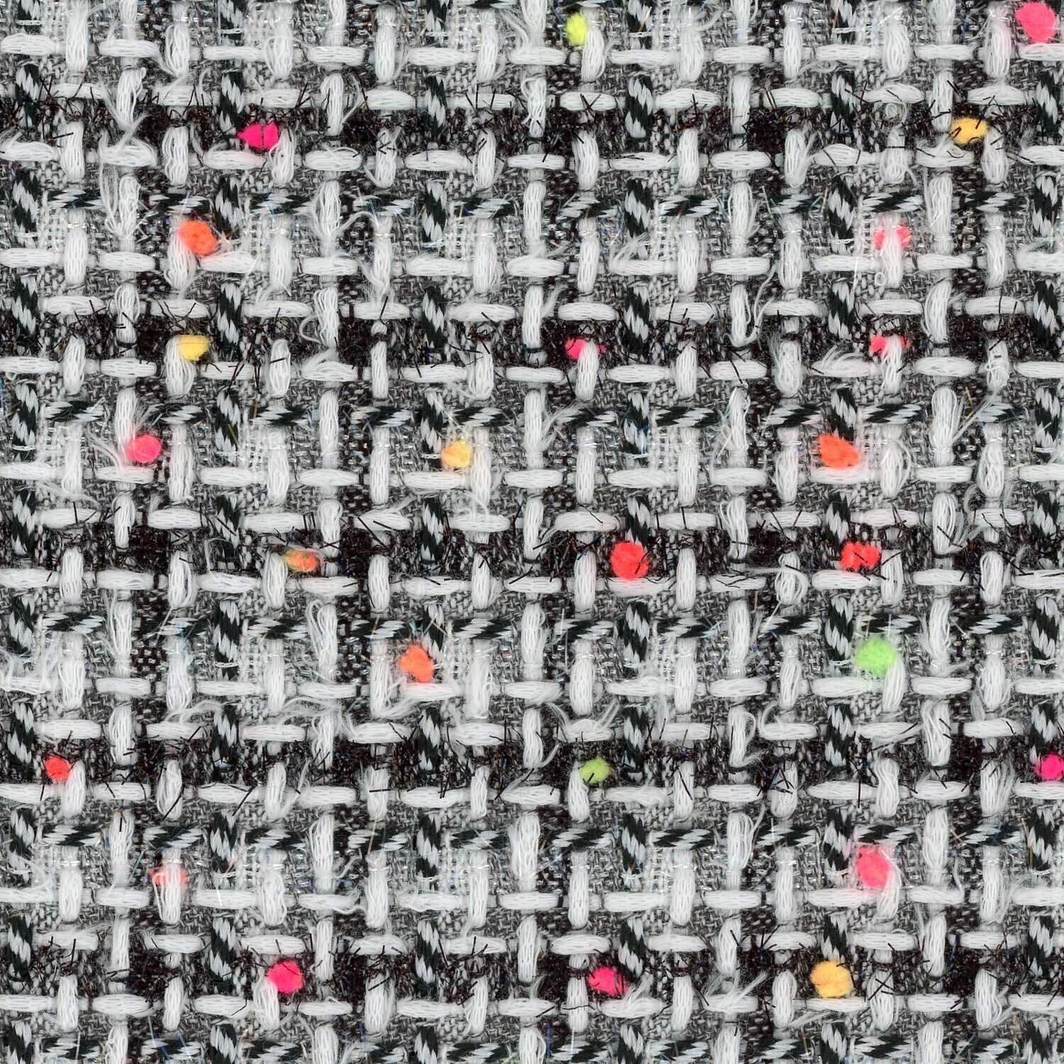 Cotton based black and white check tweed with multi-coloured pom-pom yarns in the warp.