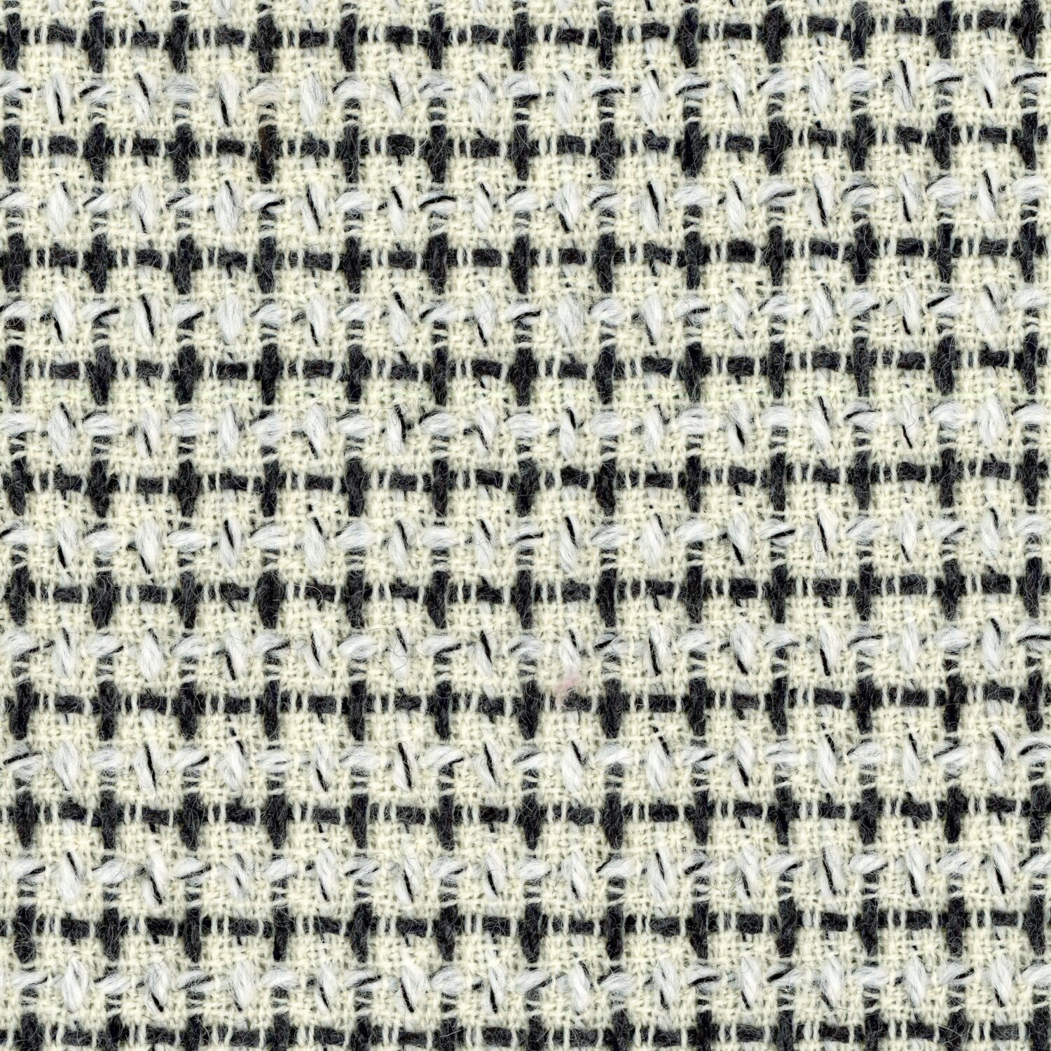 Cream white and darky grey wool boucle checked tweed.
