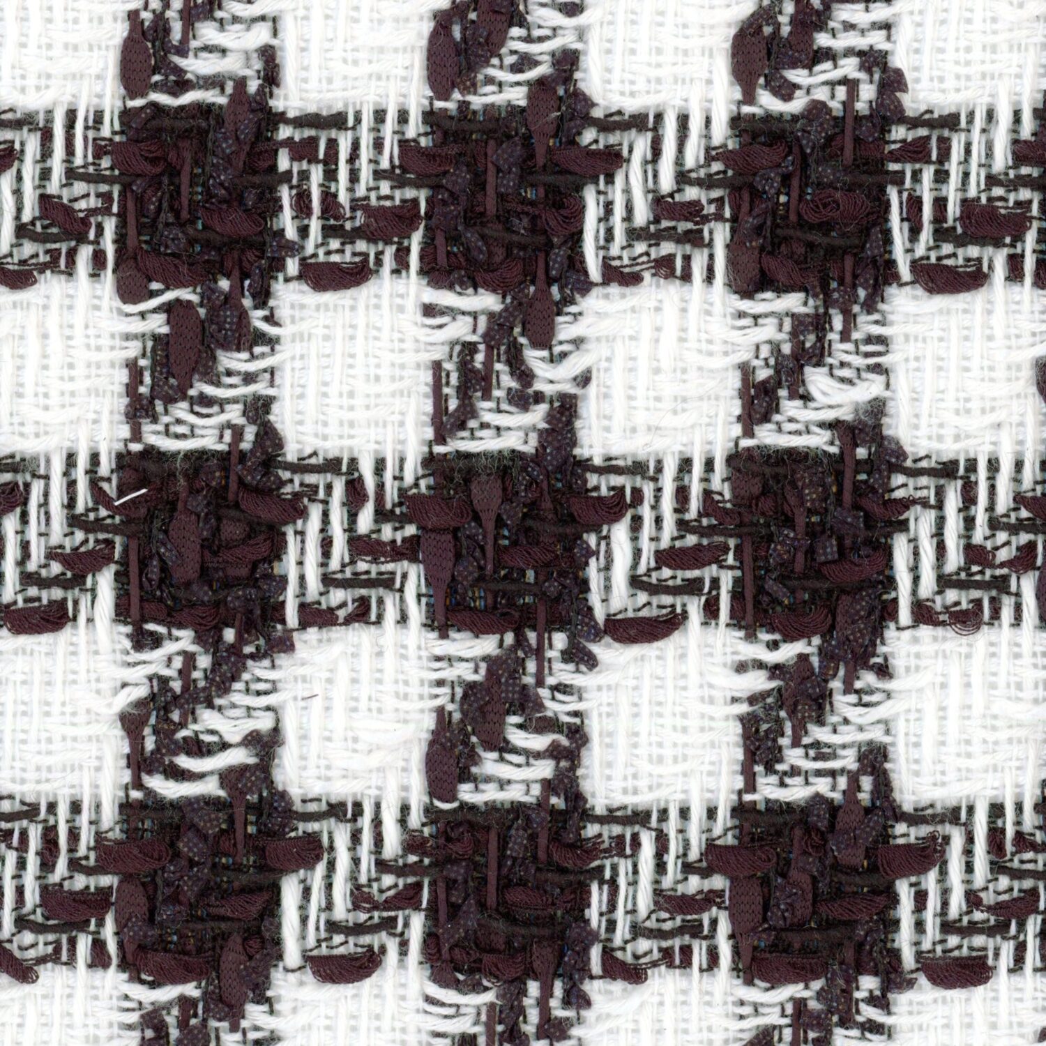 A traditional black and white houndstooth tweed.