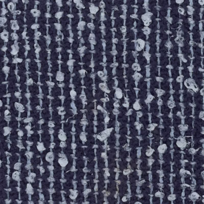 Dyed navy wool based dye piece. With silvery blue yarns in the warp at short regular intervals.