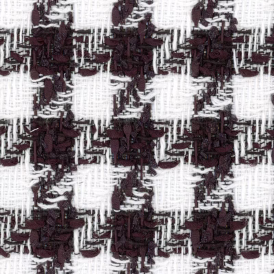 A traditional black and white houndstooth tweed.