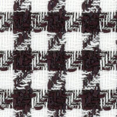 A traditional black and white houndstooth tweed.