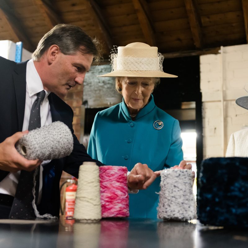 Princess Alexandra being shown around the factory